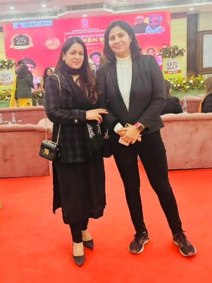 With a colleague at the International Women Summit. Events like these are a great source of inspiration.