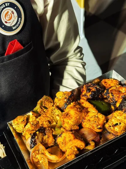 Another look at my succulent paneer tikka, fresh from the tandoor. This classic Indian snack is perfect for any event, from weddings to corporate gatherings.