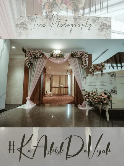 A shot of the beautiful floral entrance to a mehndi and engagement party, showcasing the event's decor and branding.