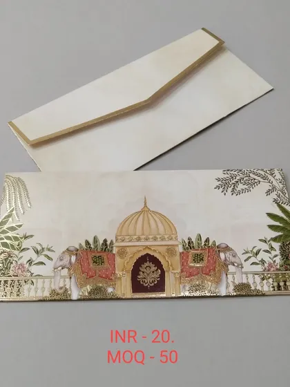 This is one of my classic designs for a wedding shagun envelope. It features a detailed palace entrance with decorated elephants, finished with elegant gold foil on high-quality paper.