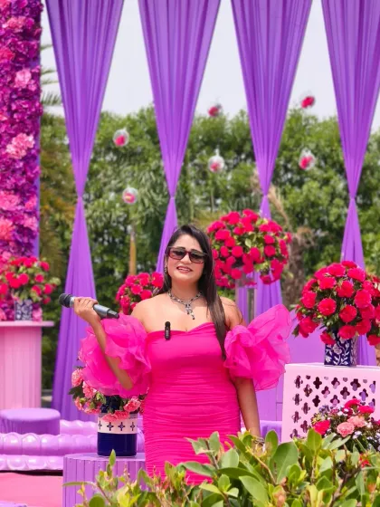 Mic in hand, ready to host this vibrant Haldi in Jim Corbett. The lush greenery and colorful decor created a perfect carnival-like atmosphere.