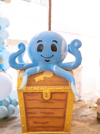 It's all in the details. This cute octopus sitting on a treasure chest was one of the many props I used to bring the underwater world to life.