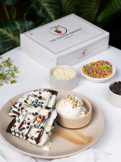 A delicious do-it-yourself waffle plate. We provide the waffles, ice cream, and a variety of toppings like chocolate chips and sprinkles so you can create your own masterpiece.