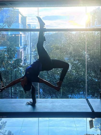 Pilates is a journey of self discovery. This stunning pose against the window on the Cadillac is a celebration of movement and mindfulness.