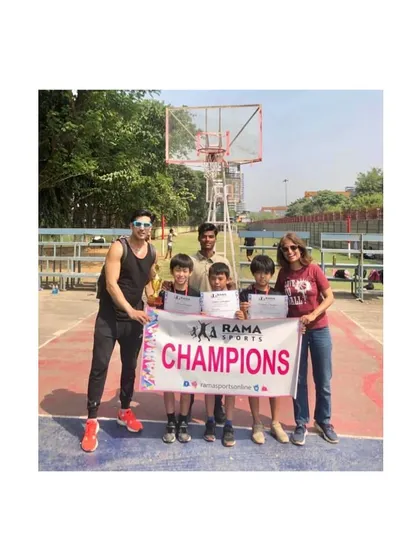Our U-12 boys' team celebrating as champions at a Rama Sports event. Their hard work in training led to this first-place finish.