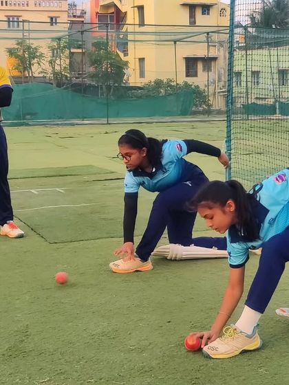 Our U-12 girls practicing their fielding technique. These drills are designed to build muscle memory for clean pickups and sharp reflexes.