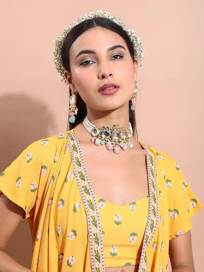 My work also includes modern ethnic wear. Here, I styled a vibrant yellow co-ord set with a delicate floral headband and contemporary jewelry, creating a fresh, festive look that feels both traditional and current.
