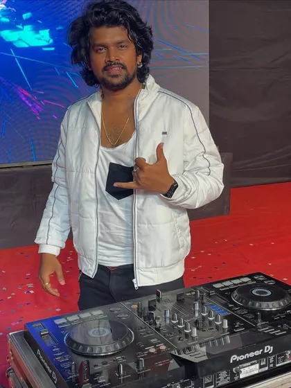 Posing behind my Pioneer DJ setup after a killer set at the Bharatiya Vidyapeeth college festival.
