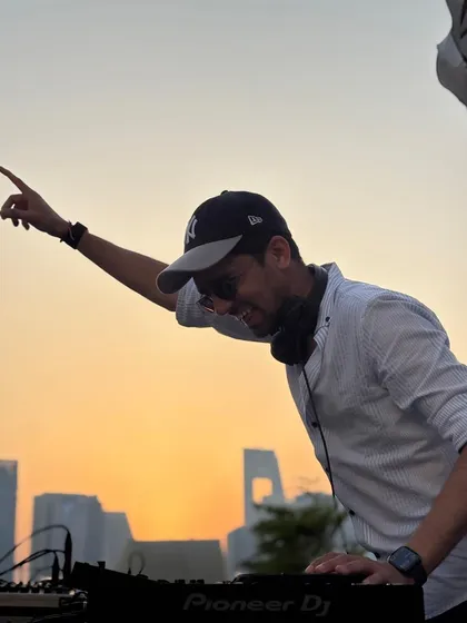 Capturing the perfect sunset shot during a gig in Ghana. Destination weddings allow for these incredible moments where music and location blend perfectly.