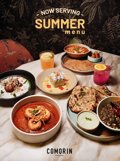 A beautiful spread of our summer menu, featuring light curries, fresh salads, and cooling desserts.