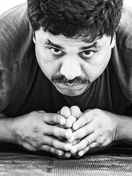 A close-up of a practitioner in a focused state. In their own way, each person connects to themselves through the practice.