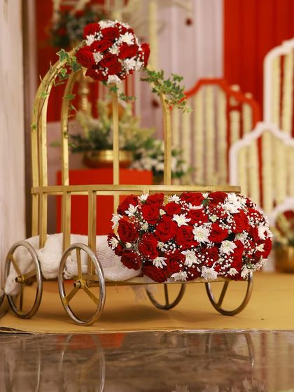 For this princess's arrival, I designed a beautiful floral carriage. It served as a unique and charming entry point before she was placed in the cradle for her naming ceremony.