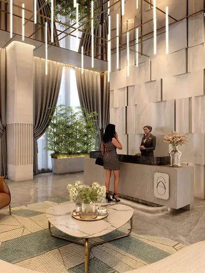The lobby of a boutique apartment building in Nagpur, where Fontane Sclare walls meet Burberry beige floors for a sublime first impression. Each detail radiates sophistication, from the exotic white stone highlighters to the metallic painted ceilings and branded furnishings.