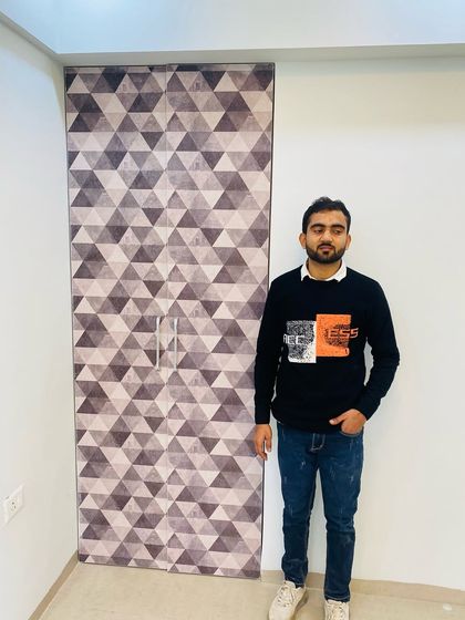 Presenting a finished wardrobe with a full-body geometric laminate, a design that is both functional and a piece of art.