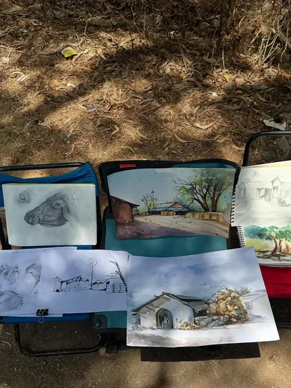 Another view of the collected artworks from the Aarey session. You can see a mix of landscape studies, animal sketches, and architectural drawings.