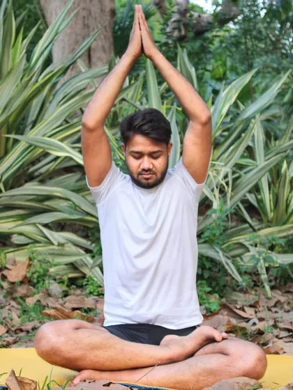 The ultimate goal of yoga is to find a state of inner calm and balance. Here, in a simple seated meditation pose, I connect with my breath and the stillness within, a practice we conclude every session with to integrate the benefits of our work.
