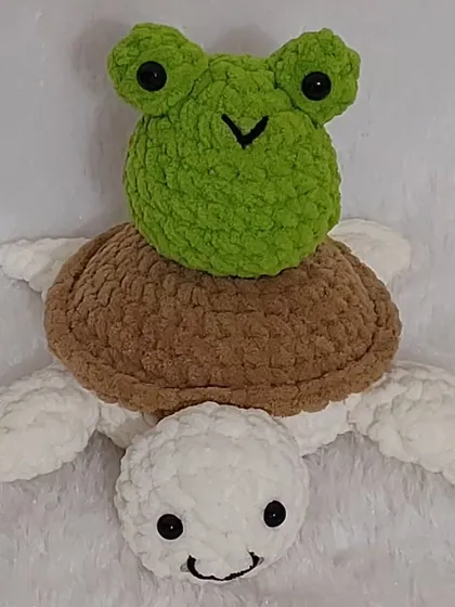 This was a fun custom order: a little froggy sitting on top of a turtle! I love bringing your quirky and creative amigurumi ideas to life.