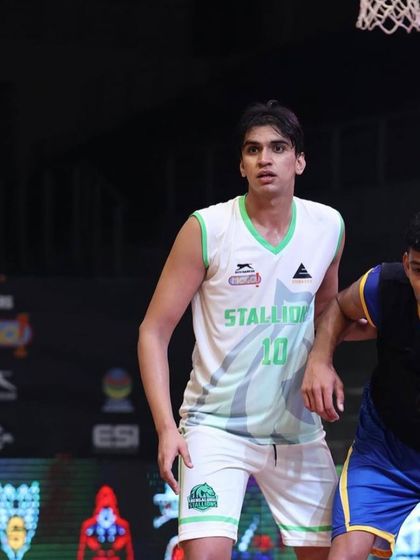 A player locked in on defense during a pro league game. We teach our players to be complete, two way contributors.