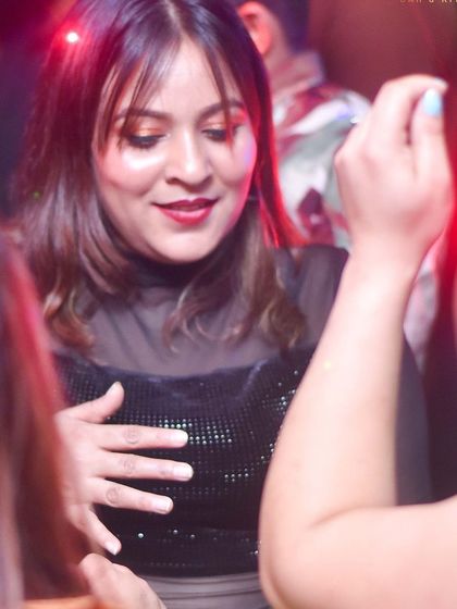 A guest lost in the music at Drava. The dance floor is a place to forget your worries and just move.