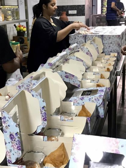 Preparing special meal boxes for a corporate client to celebrate Women's Day. It was a pleasure to put together these thoughtful packages to honor the occasion.