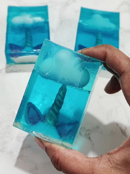 A cute unicorn-in-the-sky soap, demonstrating the use of embeds in clear soap.