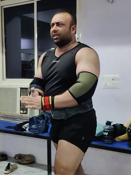 Ready for the next set. Using SBD elbow sleeves to provide compression and support during heavy pressing movements.