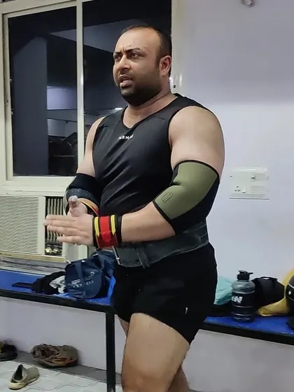 Ready for the next set. Using SBD elbow sleeves to provide compression and support during heavy pressing movements.