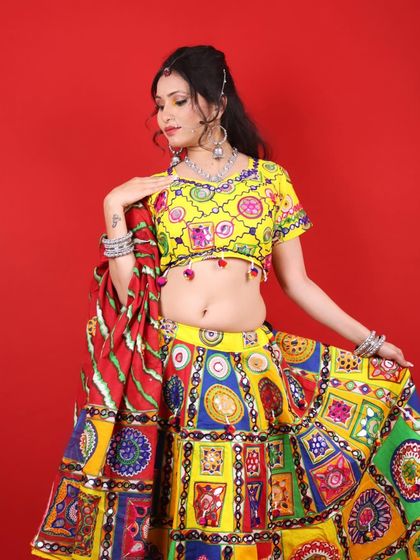 Another beautiful shot of the Navratri look, with the model showing off her colorful lehenga and festive makeup.