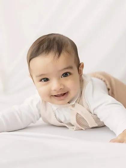 A simple, clean portrait of the baby during his tummy time.