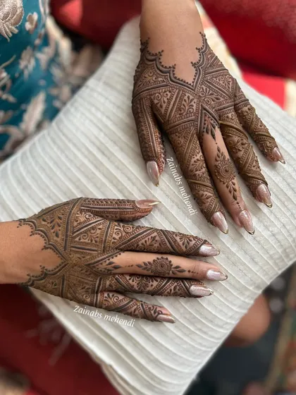 Another view of this modern, geometric design, showing how it beautifully adorns both hands.