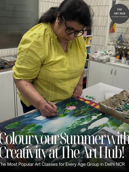 A student is deeply focused on her painting of a lily pond, adding fine details to the water lilies. My classes provide a space for you to immerse yourself in your art.