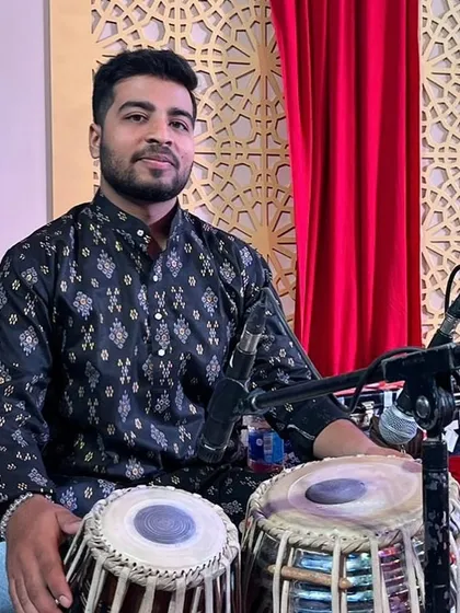 Another portrait from the same concert, seated with my tabla.