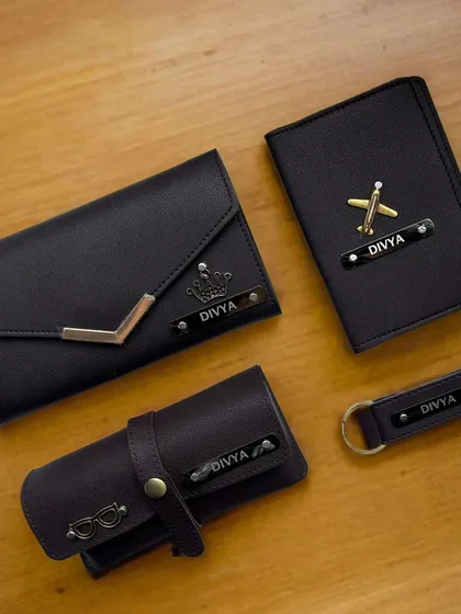 This 4-in-1 ladies' accessory set is a popular choice for a reason. It includes a personalized wallet, passport cover, keychain, and eyewear case, all crafted from high-quality material and customized with a name and charm.