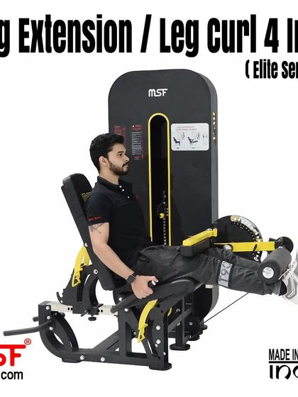 A user at the peak of the leg extension.