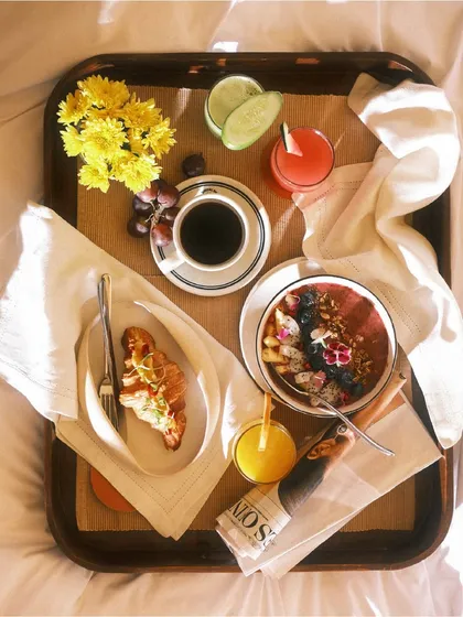 Mornings here are unhurried. We serve beginnings on a tray, featuring a sun-kissed croissant, a vibrant berry bowl, and freshly brewed coffee, best enjoyed with the gentle rhythm of slow living.