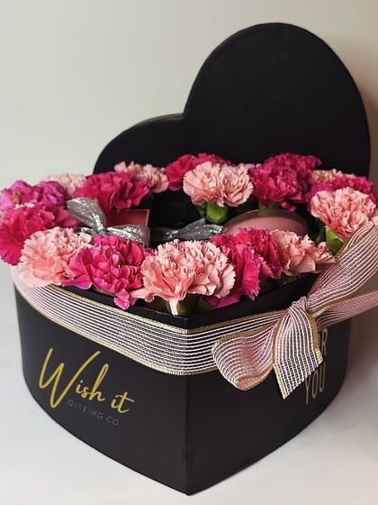 A closed view of the heart-shaped "For You" box, perfect for a bride-to-be. The elegant black box with gold lettering and a soft ribbon makes for a stunning presentation.