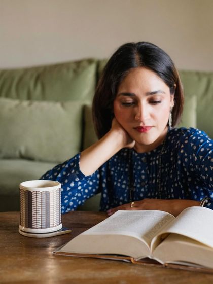 An author lost in a book. Capturing people engaged in their passions, whether it's reading or creating, always results in beautifully authentic photos.