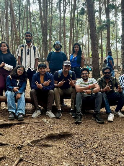 Taking a break in the famous pine forests of Kodaikanal. These moments of rest and conversation are what make group travel special.