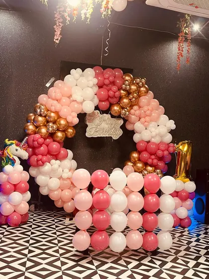 Another angle of the main unicorn party backdrop, showing how it fills the space and creates a central point for the celebration.