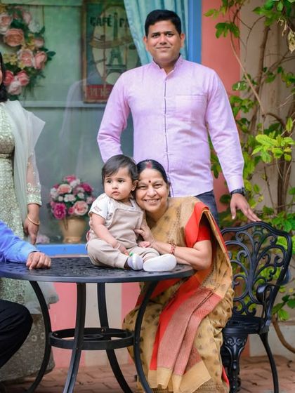 Our studio is designed to capture beautiful moments with the entire family. These images show how parents and grandparents can join the fun, creating cherished family portraits.