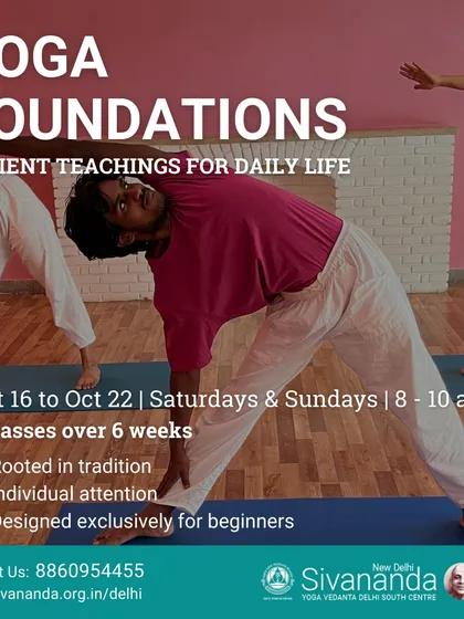 Our weekend Yoga Foundations course is a popular choice for beginners. Here, students are seen practicing Trikonasana (Triangle Pose), which strengthens the legs and torso.