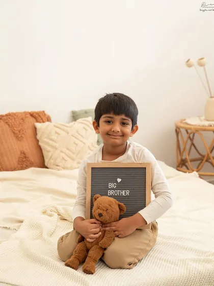So proud to be a big brother. Using a letterboard is a super cute way to announce his new role in the family.