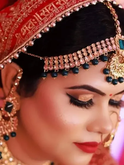 A closer look at this bride's eye makeup. I created a sharp, winged eyeliner and blended golden shimmer on the lids to make her eyes the star of the show. This is a perfect example of detailed bridal eye makeup.