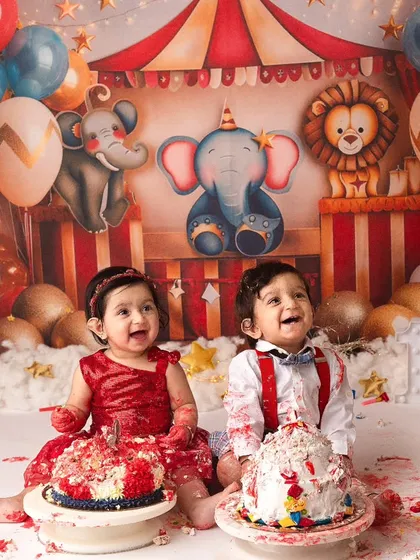 Double the fun and double the smiles! These adorable twins had the best time at their circus-themed first birthday cake smash. It was such a joy to capture their happy, messy celebration.