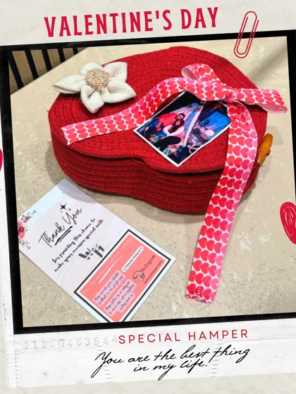 A special Valentine's hamper for the best thing in your life. This heart-shaped box is personalized with a photo and filled with thoughtful gifts.
