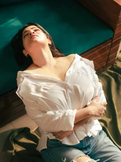 A sun-drenched, relaxed pose. This shot from our 'serving heat' series captures a natural and sensual vibe, perfect for a lifestyle portfolio.