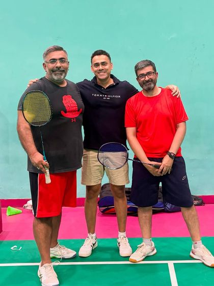 A photo of me with two of our dedicated members. It's the people who make our community so special.