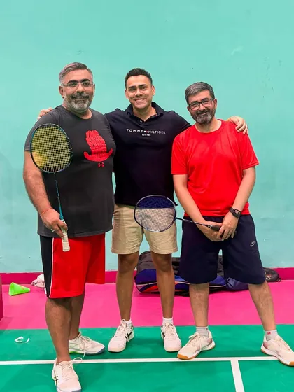 A photo of me with two of our dedicated members. It's the people who make our community so special.