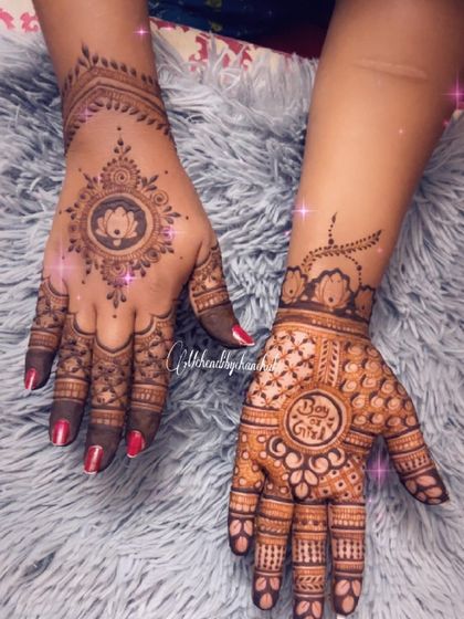 A lovely pair of hands showing two different styles for a baby shower, one with a 'Boy or Girl' theme and the other with a classic lotus design.