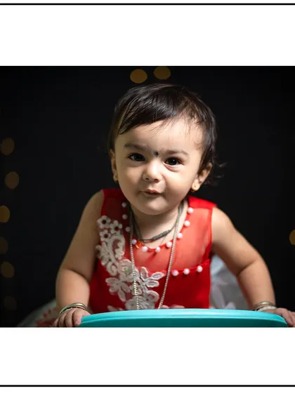 A confident and direct portrait of a toddler in the studio. I work to make children feel comfortable in front of the camera.